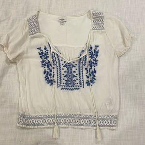 White and blue American eagle blouse size medium